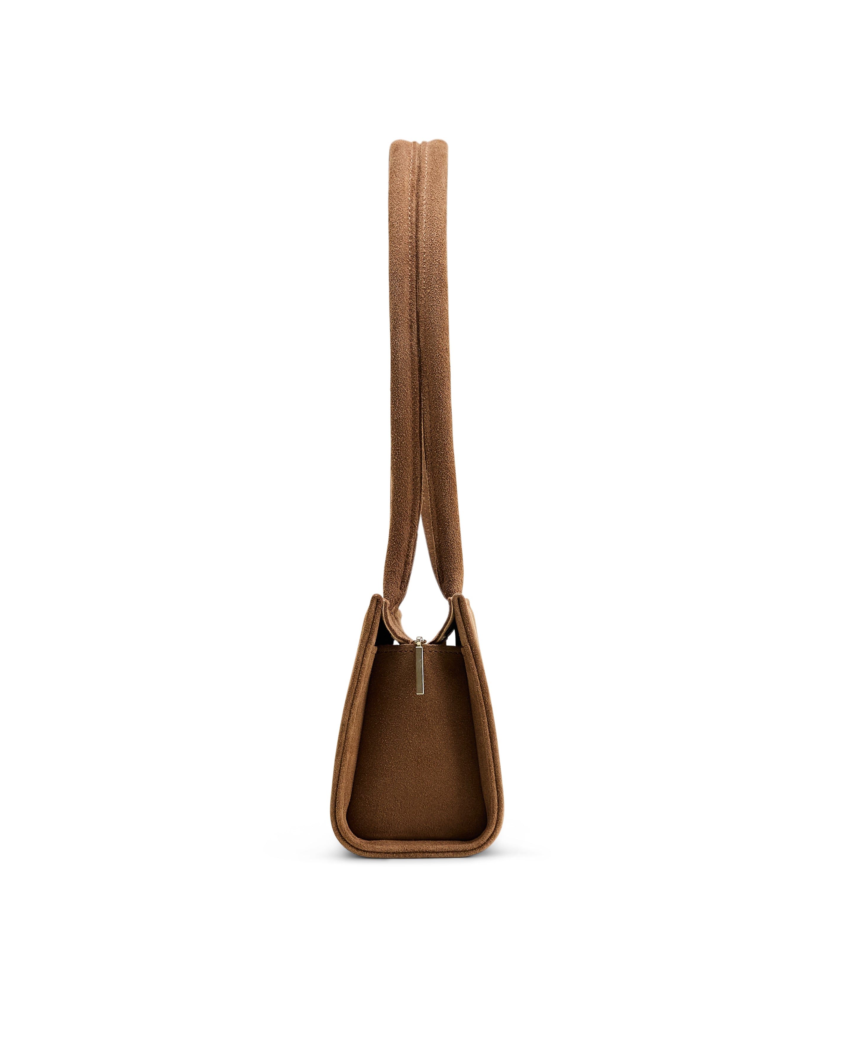 Side view of Poelle Atelier brown east-west horizontal suede bag with long straps
