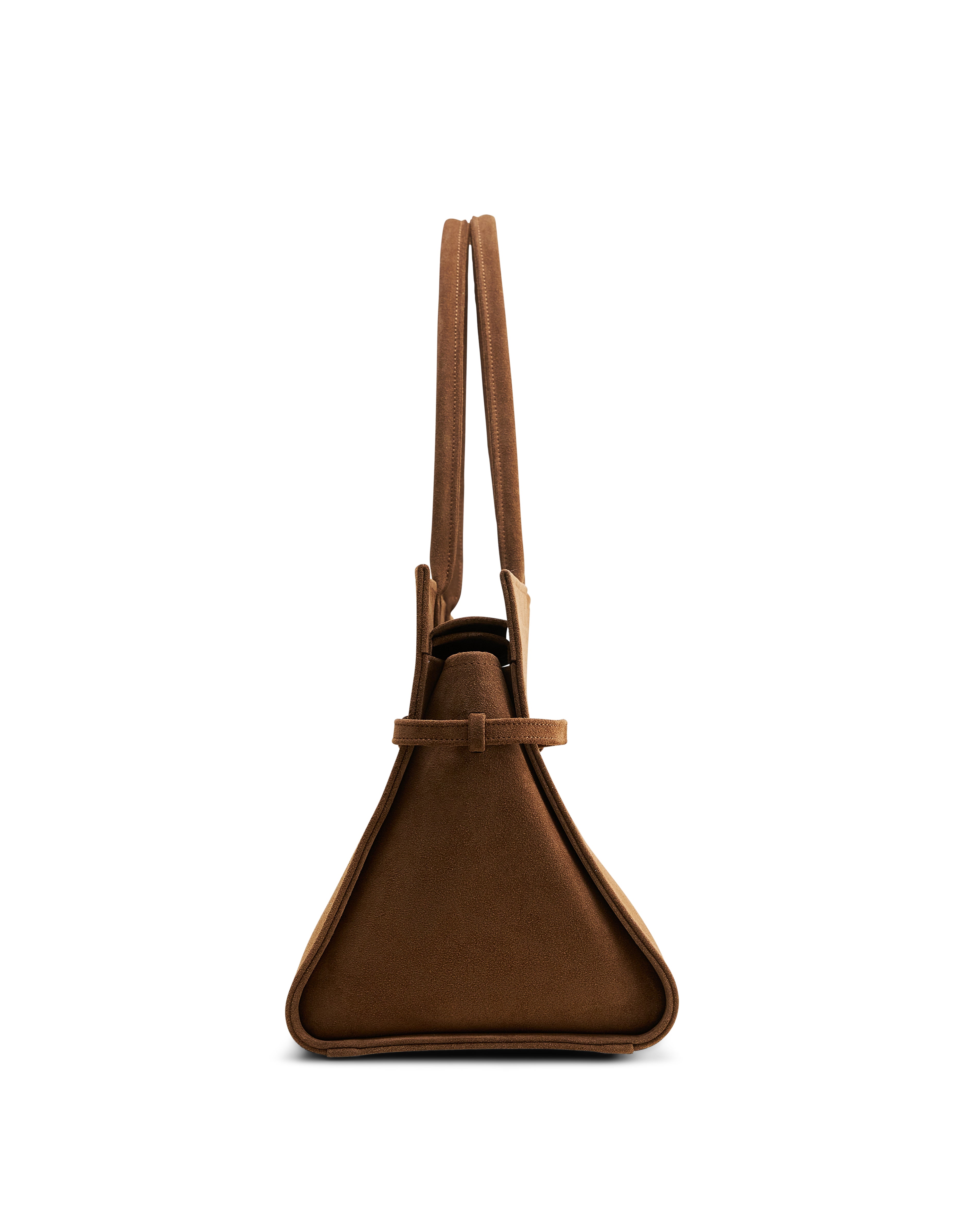 Side view of luxury suede caramel bag by Poelle Atelier with adjustable shoulder straps