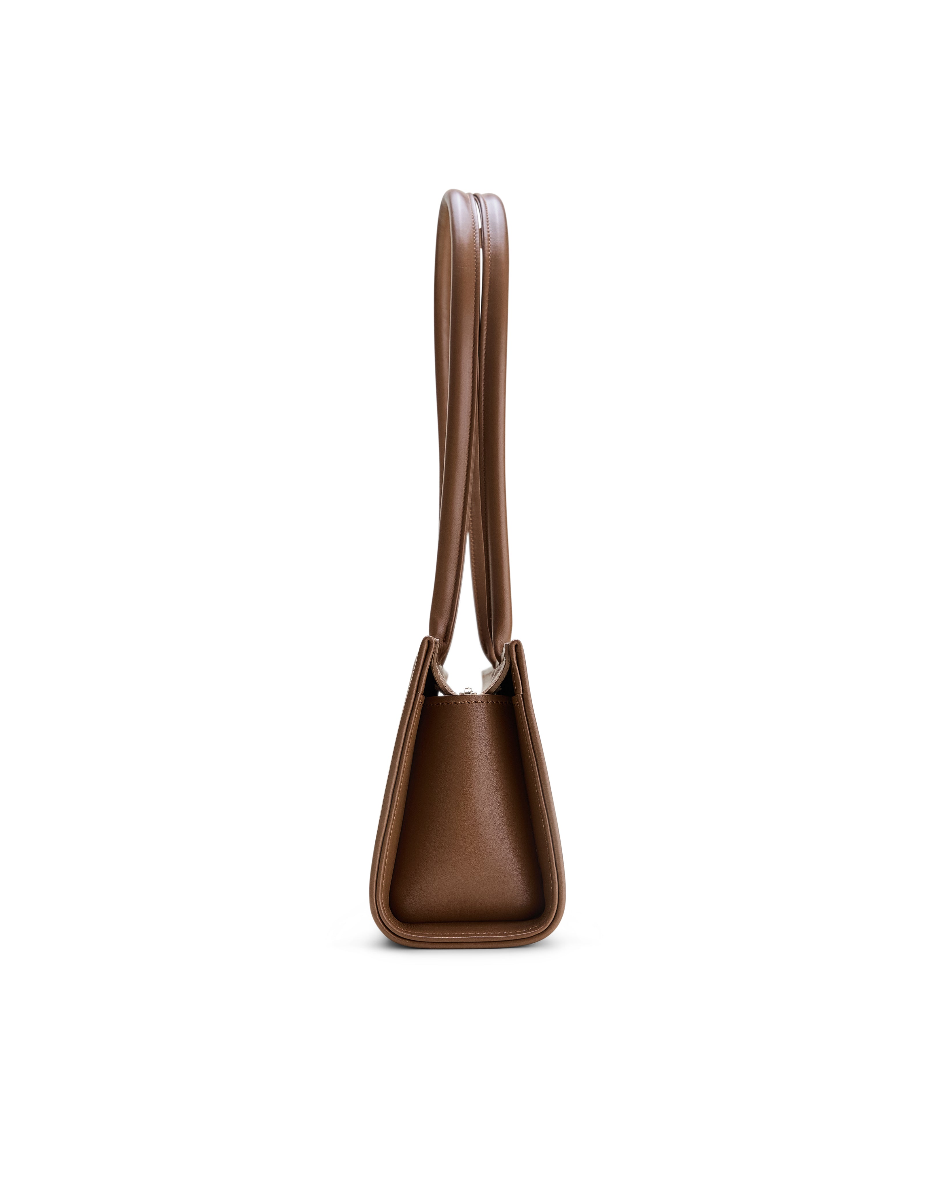 Poelle Atelier brown east-west horizontal suede bag side view with long handles