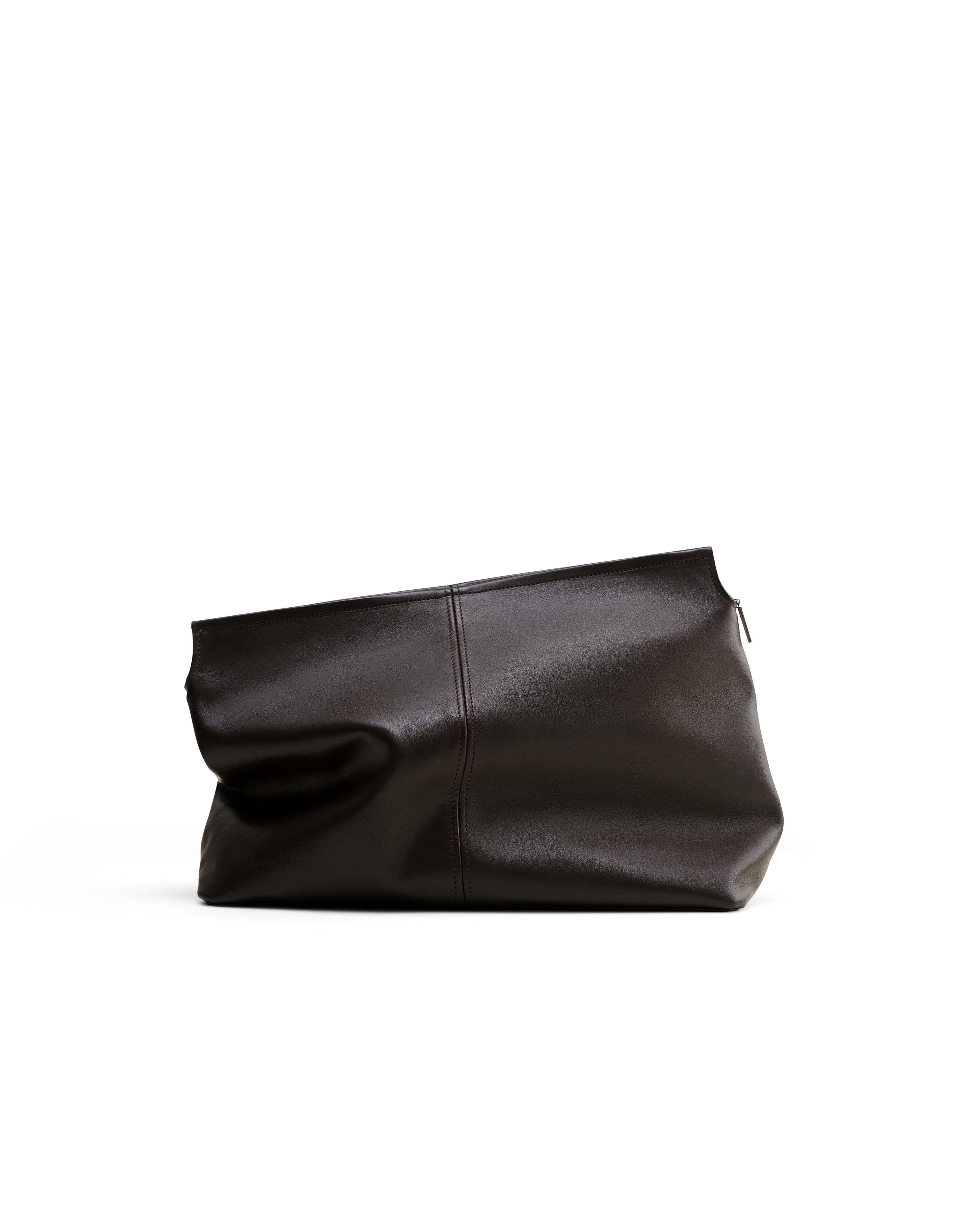 Poelle Atelier luxury leather clutch bag in black with sleek minimalist design and zipper closure