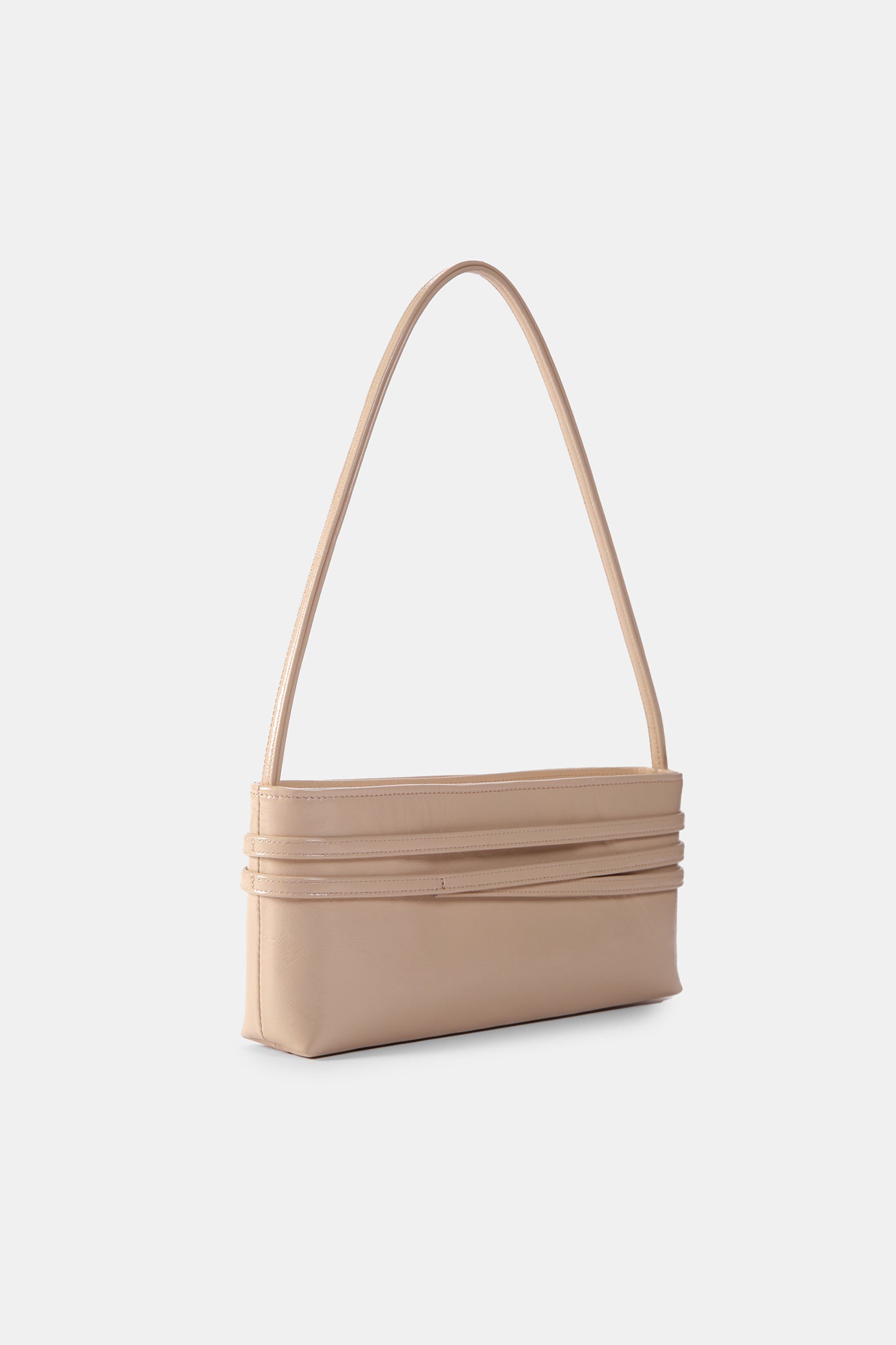 Poelle Atelier milky leather shoulder bag in beige with ruched detailing and slim strap